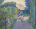 Frau sitzend in einem Garten - Frederick Carl Frieseke — Ansicht des Kunstwerks