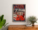 Vintage-Poster Bretagne – Paramé, Bucht von Saint-Malo, gerahmt über einer Holzkommode, zwischen Pflanzen.
