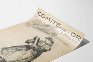 Historisches Plakat – Amiens, Comité de l’Or – Abel-Truchet, auf einer gebogenen Papierseite präsentiert, perspektivisch gesehen.