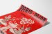 Vintage-Werbeplakat Paris–Dijon, Spielzeug und Neujahrsgeschenke, auf gebogenem Papierblatt, perspektivische Ansicht.