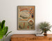 Vintage-Poster Touraine, Garten Frankreichs, gerahmt über einer Holzkommode, zwischen Pflanzen.