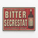 Vintage-Poster Bitter Secrestat - Haus gegründet 1851 — gerahmtes Bild an der Wand
