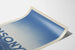 Vintage-Poster Disonyl im blauen Farbverlauf