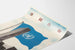 Poster des Vereinten Nationen mit blauer Flagge und Text in asiatischen Schriftzeichen